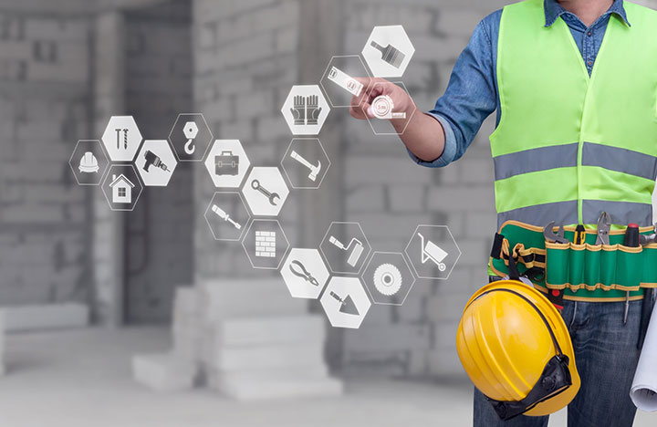 Construction worker selecting icons floating in the air.