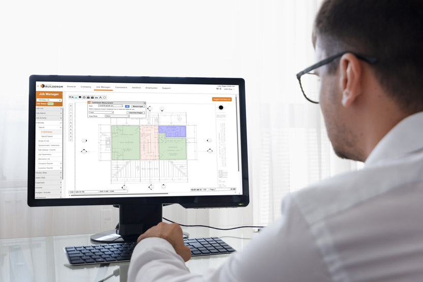 Man with glasses using Hyphen BuilderGM software on a Mac