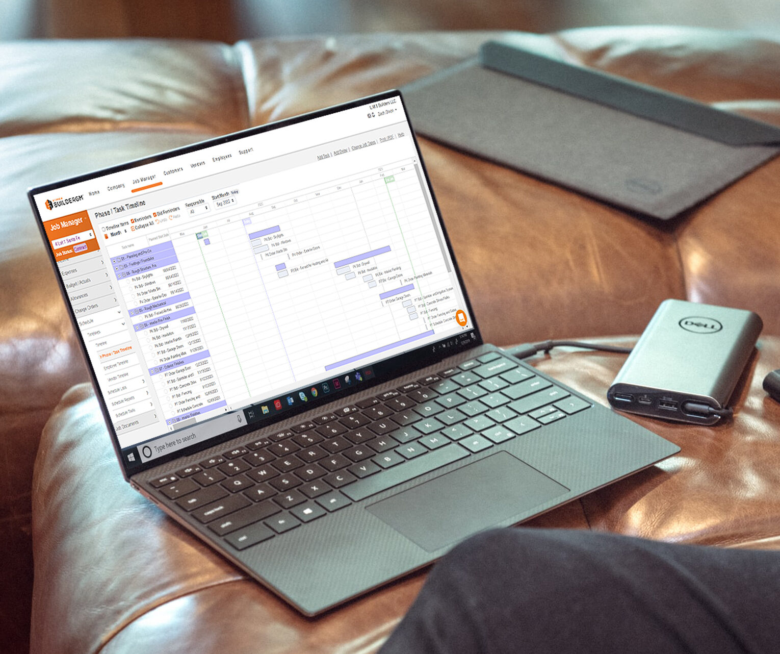 Hyphen BuilderGM schedule management on laptop