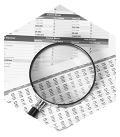 Magnifying glass over an accounting ledger